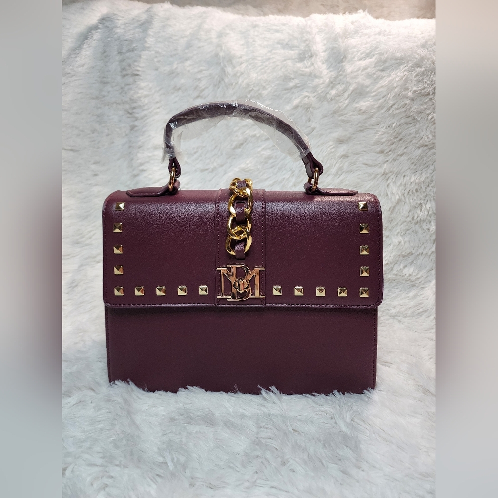 Elegant Burgundy Handbag with Gold Accents